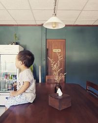 Girl looking at illuminated table