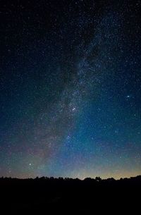 Low angle view of stars in sky at night