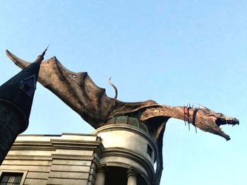 Low angle view of horse against clear sky