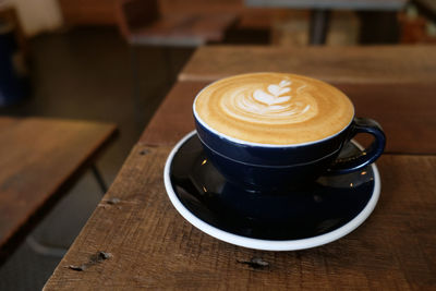 Close-up of cappuccino on table