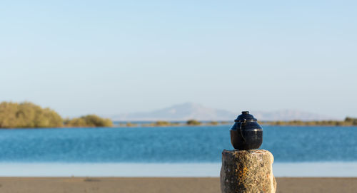 Close-up of blue sea against clear sky