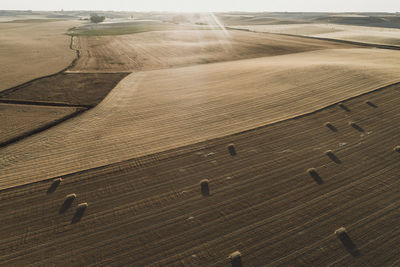 Dry fields at sunset from aerial view