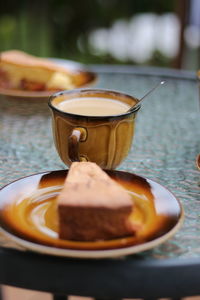 Close-up of coffee cup on table