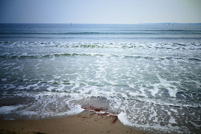 Scenic view of sea against clear sky