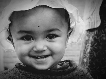 Close-up portrait of smiling boy