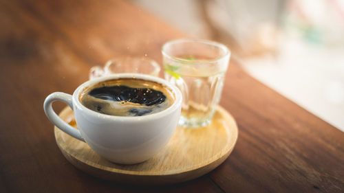 Close-up of tea cup on table