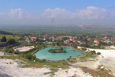 High angle view of river amidst landscape against sky