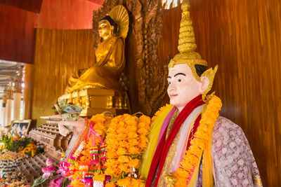 Buddha statue in front of temple