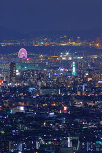 Illuminated cityscape at night