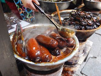 Close-up of meat on grill