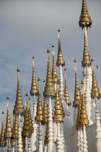 View of temple against building