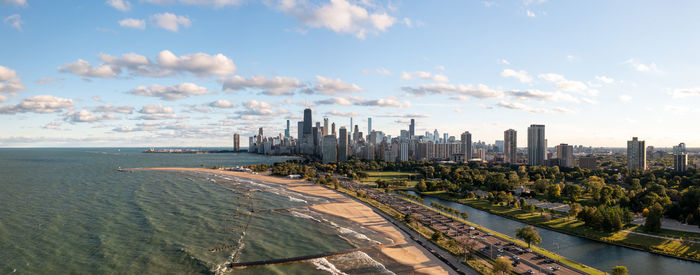 Aerial panorama of chicago skyline from above lake michigan near lake shore drive in lincoln park