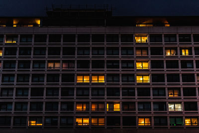 Low angle view of illuminated building at night