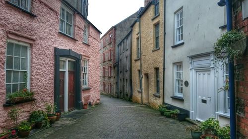 Narrow alley along buildings