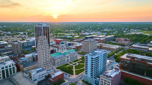 High angle view of cityscape against sky during sunset