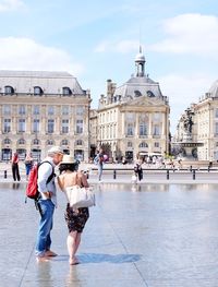 Tourists in front of historic building