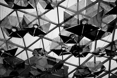 Low angle view of umbrellas hanging on ceiling