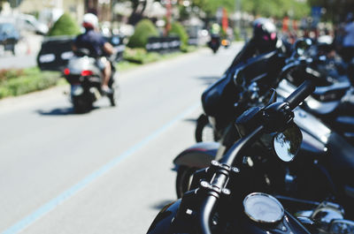 Close-up of motorcycle on street