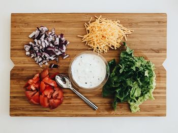 High angle view of chopped vegetables on cutting board