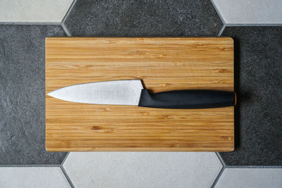 High angle view of bread on cutting board