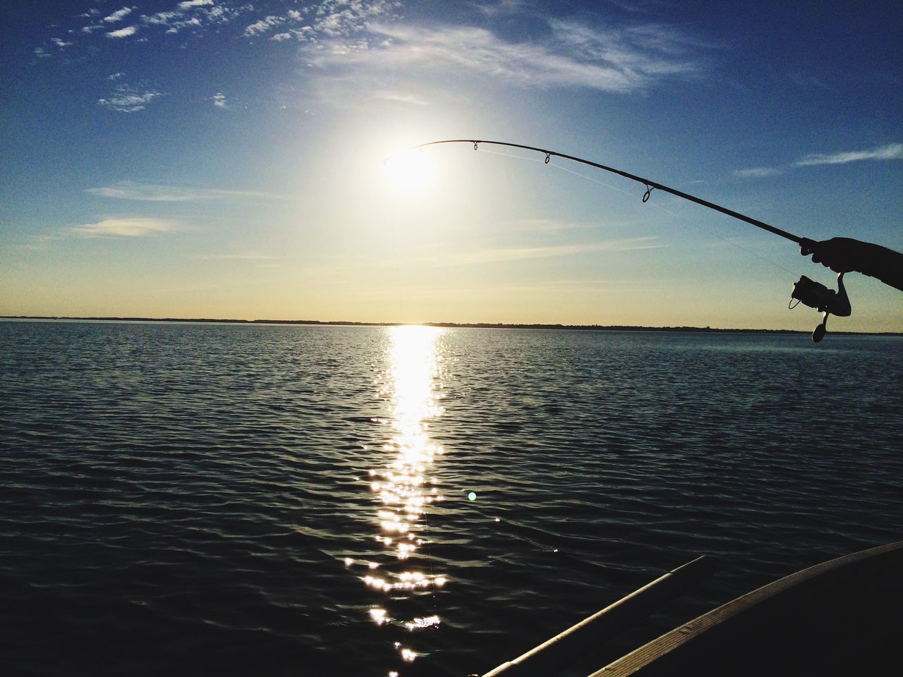 sun, water, sunset, sea, horizon over water, tranquility, scenics, sky, tranquil scene, reflection, beauty in nature, sunlight, nature, idyllic, silhouette, rippled, sunbeam, waterfront, orange color, outdoors