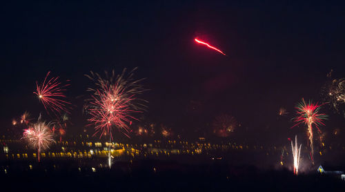 Firework display at night