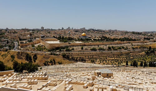 Aerial view of old town against clear blue sky