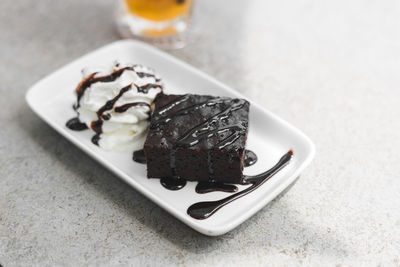 Close-up of chocolate cake in plate on table