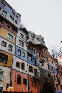 Low angle view of buildings against clear sky