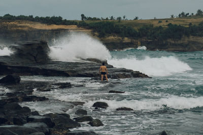 Scenic view of waves splashing