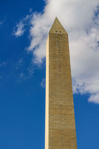 Low angle view of monument against blue sky