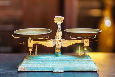 Close-up of old tea light on table