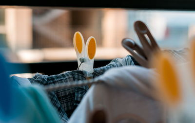 Close-up of man working on table at home