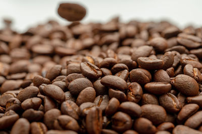 Close-up of coffee beans on table