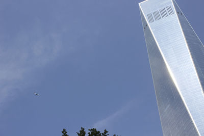 Low angle view of modern buildings against sky