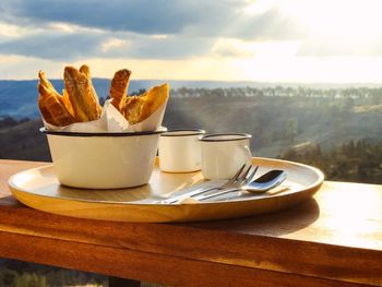 Close-up of food on table against sky