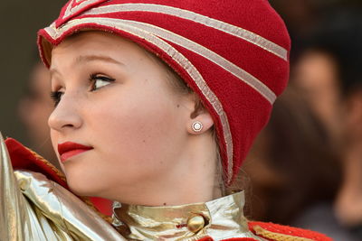 Close-up portrait of woman looking away