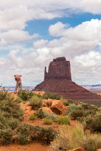 Rock formations on landscape against sky