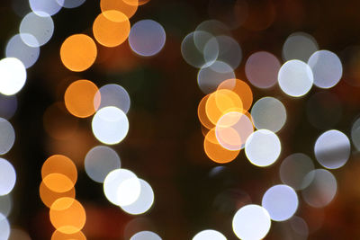 Full frame shot of illuminated christmas lights at night