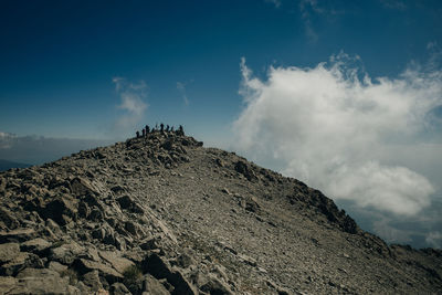 Low angle view of rocks against sky