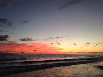 Scenic view of sea at sunset