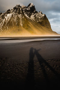 Scenic view of beach against mountain