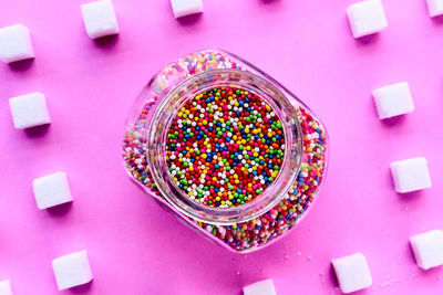 High angle view of multi colored candies on table