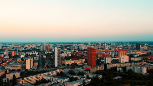 High angle view of buildings against clear sky