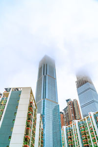 Low angle view of modern buildings against sky