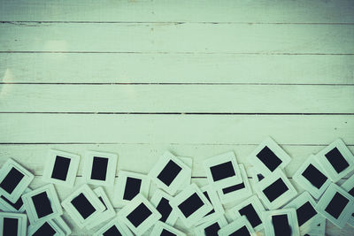 Close-up of blank photos on table