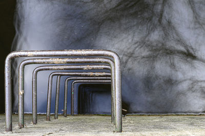 Empty chair against wall