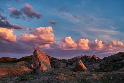 Panoramic view of rock formations against sky