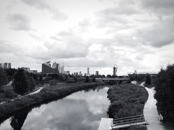 View of city against cloudy sky