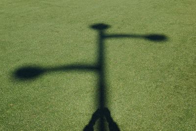 High angle view of shadow on grass